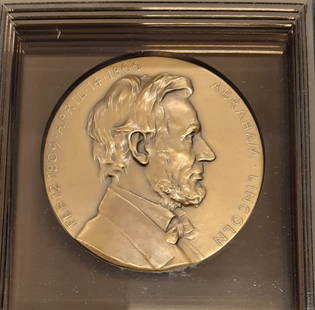 1934 Lincoln Bronze Medal 2 3/4 in by Medallic Art Co with Display Stand: 1934 Lincoln Bronze Medal 2 3/4 in by Medallic Art Co with Display Stand This 1934 Lincoln medal features a diameter of 2 3/4 inches and is crafted from high-quality bronze. It is a product of the Med