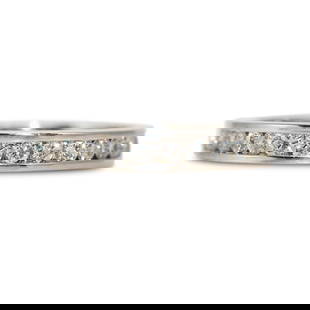 18K White Gold .50ct Diamond Wedding Band Size 4.75 Sizable: 18K White Gold .50ct Diamond Wedding Band Size 4.75 Sizable This elegant 18K White Gold Diamond Band features a total diamond weight of .50ct, showcasing round brilliant cut diamonds that encircle app