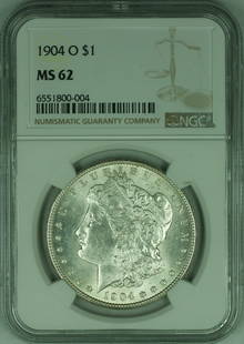 1904-O NGC MS62 Morgan Silver Dollar Coin Uncirculated: 1904-O NGC MS62 Morgan Silver Dollar Coin Uncirculated This 1904-O Morgan Silver Dollar Coin is a stunning example of numismatic craftsmanship. Certified by NGC with a grade of MS 62, this uncirculate