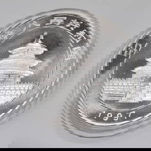 1997 China 10 Yuan Panda Silver Coin Large Date .999 Fine Uncertified: 1997 China 10 Yuan Panda Silver Coin Large Date .999 Fine Uncertified This 1997 China 10 Yuan Panda coin features a stunning design and is crafted from 1 ounce of .999 fine silver. As part of the Larg
