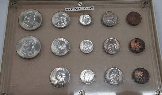 1948 Brilliant Uncirculated Coin Set PD&S 14 Coins Silver: 1948 Brilliant Uncirculated Coin Set PD&S 14 Coins Silver This 1948 PD&S UNC Set is a collection of 14 brilliant uncirculated coins, featuring denominations from cent to half dollar. Each coin is a te