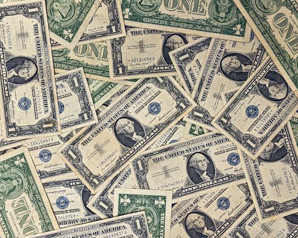 1957 $1 Silver Certificate Pack of 50 Star Notes: 1957 $1 Silver Certificate Pack of 50 Star Notes This listing features a pack of fifty 1957 $1 Silver Certificates, known for their distinctive star notes. Each note is circulated and presents in a gr