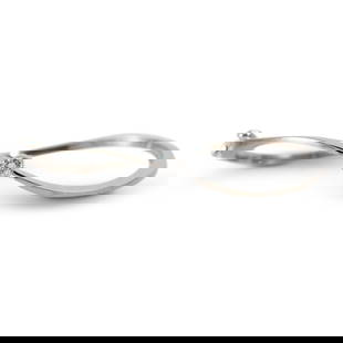 18K White Gold Vintage Bangle Bracelet with .30ct Diamond: 18K White Gold Vintage Bangle Bracelet with .30ct Diamond This exquisite 18K White Gold Bangle Diamond Bracelet features a stunning solitaire diamond weighing .30 carats, showcasing a round brilliant