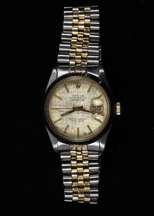 Rolex Datejust 16013 Vintage Gold Silver Jubilee Watch with Fluted Bezel: Rolex Datejust 16013 Vintage Gold Silver Jubilee Watch with Fluted Bezel This stunning Rolex Datejust 16013 wristwatch features a luxurious gold and silver Jubilee bracelet paired with a striking gold