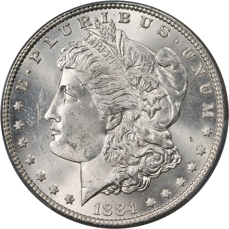 1884-P Morgan Silver Dollar PCGS MS63 Stunning Eye Appeal: 1884-P Morgan Silver Dollar PCGS MS63 Stunning Eye Appeal This stunning 1884-P Morgan Silver Dollar exhibits superb eye appeal and a nice strike, graded MS63 by PCGS. Minted in Philadelphia, this unci