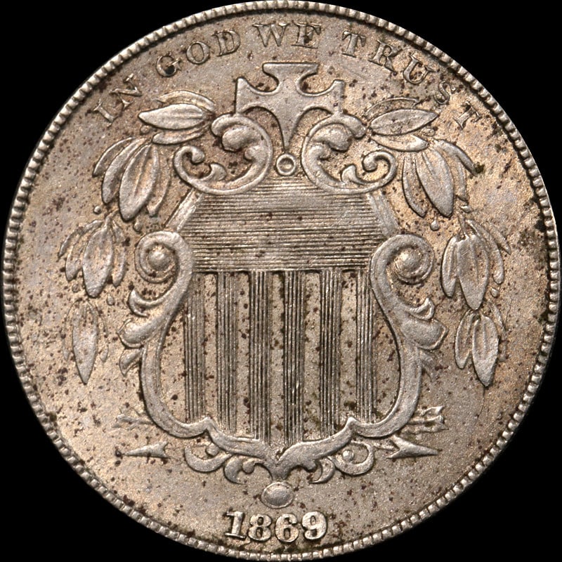 1869 Shield Nickel Circulated Uncertified Vintage Coin: 1869 Shield Nickel Circulated Uncertified Vintage Coin This 1869 Shield Nickel is a captivating piece of numismatic history. Made of nickel, this coin has been circulated, showcasing its age and chara