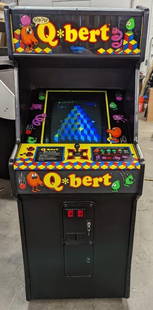 Rare 1982 Q*BERT Arcade Machine by Gottlieb Classic Gaming: Rare 1982 Q*BERT Arcade Machine by Gottlieb Classic Gaming Experience nostalgic gaming with the Q*BERT Arcade Machine by Gottlieb, released in 1982. This classic arcade machine is in excellent conditi