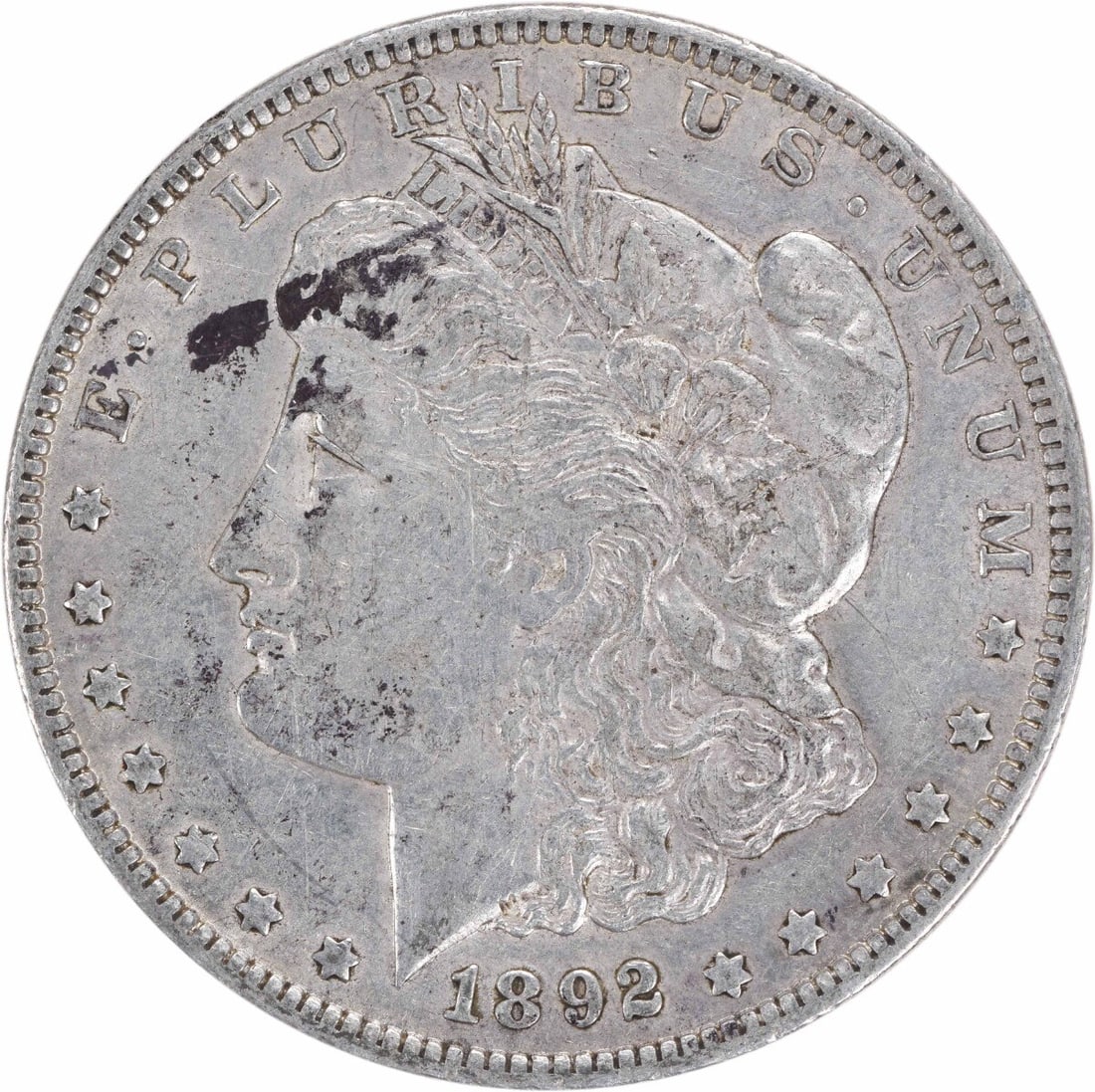 1892-O Morgan Silver Dollar XF Uncertified New Orleans Mint: 1892-O Morgan Silver Dollar XF Uncertified New Orleans Mint This 1892-O Morgan Silver Dollar is a classic piece of numismatic history, featuring the iconic design by George T. Morgan. It is in circula