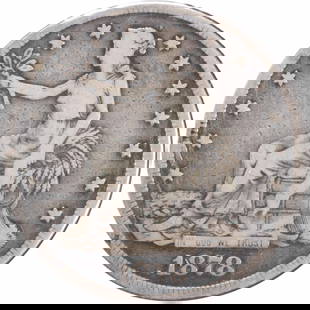 1878-S Trade Silver Dollar VG Obverse Retained Cud: 1878-S Trade Silver Dollar VG Obverse Retained Cud This 1878-S Trade Silver Dollar features an obverse retained cud, showcasing its unique character and historical significance. The coin is made of