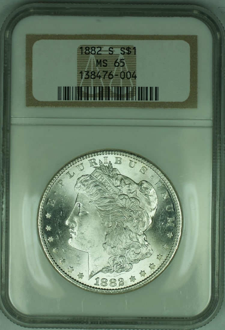1882-S Morgan Silver Dollar NGC MS 65 Uncirculated Coin: 1882-S Morgan Silver Dollar NGC MS 65 Uncirculated Coin This 1882-S Morgan Silver Dollar is a stunning example of American coinage, showcasing the iconic Morgan design. With a high grade of MS 65, thi