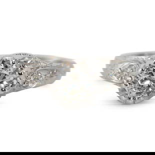 Vintage 14K White Gold Platinum Diamond Engagement Ring 1.01ct: Vintage 14K White Gold Platinum Diamond Engagement Ring 1.01ct This exquisite vintage engagement ring features a stunning 1.01 carat round brilliant cut diamond at its center, showcasing H to I color
