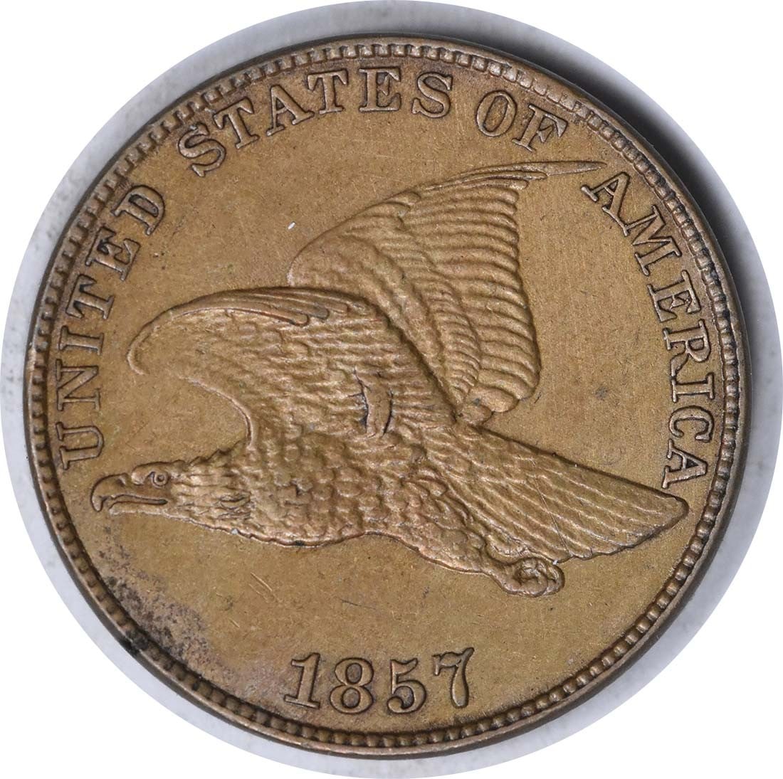 1857 Flying Eagle Cent AU Copper Uncertified Small Cent: 1857 Flying Eagle Cent AU Copper Uncertified Small Cent This 1857 Flying Eagle Cent is a remarkable piece, showcasing a beautiful design of the iconic Flying Eagle. The coin is classified as AU (About