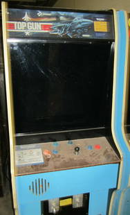 RARE 1987 Nintendo Vs Top Gun Arcade Machine Excellent Condition: RARE 1987 Nintendo Vs Top Gun Arcade Machine Excellent Condition Experience classic arcade fun with the TOP GUN Nintendo Vs Arcade Machine from 1987. This two-player arcade machine offers exciting gam