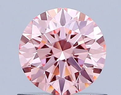 Ideal Loose Diamond - ROUND 0.68ct Fancy Vivid Pink VVS1: Ideal Loose Diamond - ROUND 0.68ct Fancy Vivid Pink VVS1 Source: This is a real non-mined Diamond that has been grown in a lab Shape: ROUND Carats: 0.68 Color: Fancy Vivid Pink Certification: IGI Vide
