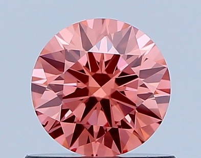 Ideal Loose Diamond - ROUND 0.6ct Fancy Vivid Pink VS2: Ideal Loose Diamond - ROUND 0.6ct Fancy Vivid Pink VS2 Source: This is a real non-mined Diamond that has been grown in a lab Shape: ROUND Carats: 0.6 Color: Fancy Vivid Pink Certification: IGI Video: