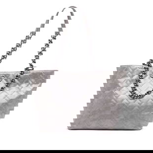 Chanel Quilted Iridescent Calfskin Shopping Tote Gray: Chanel Quilted Iridescent Calfskin Shopping Tote Gray Elevate your style with this exquisite Chanel Quilted Iridescent Calfskin Shopping in Chains Tote. This stunning bag features a luxurious