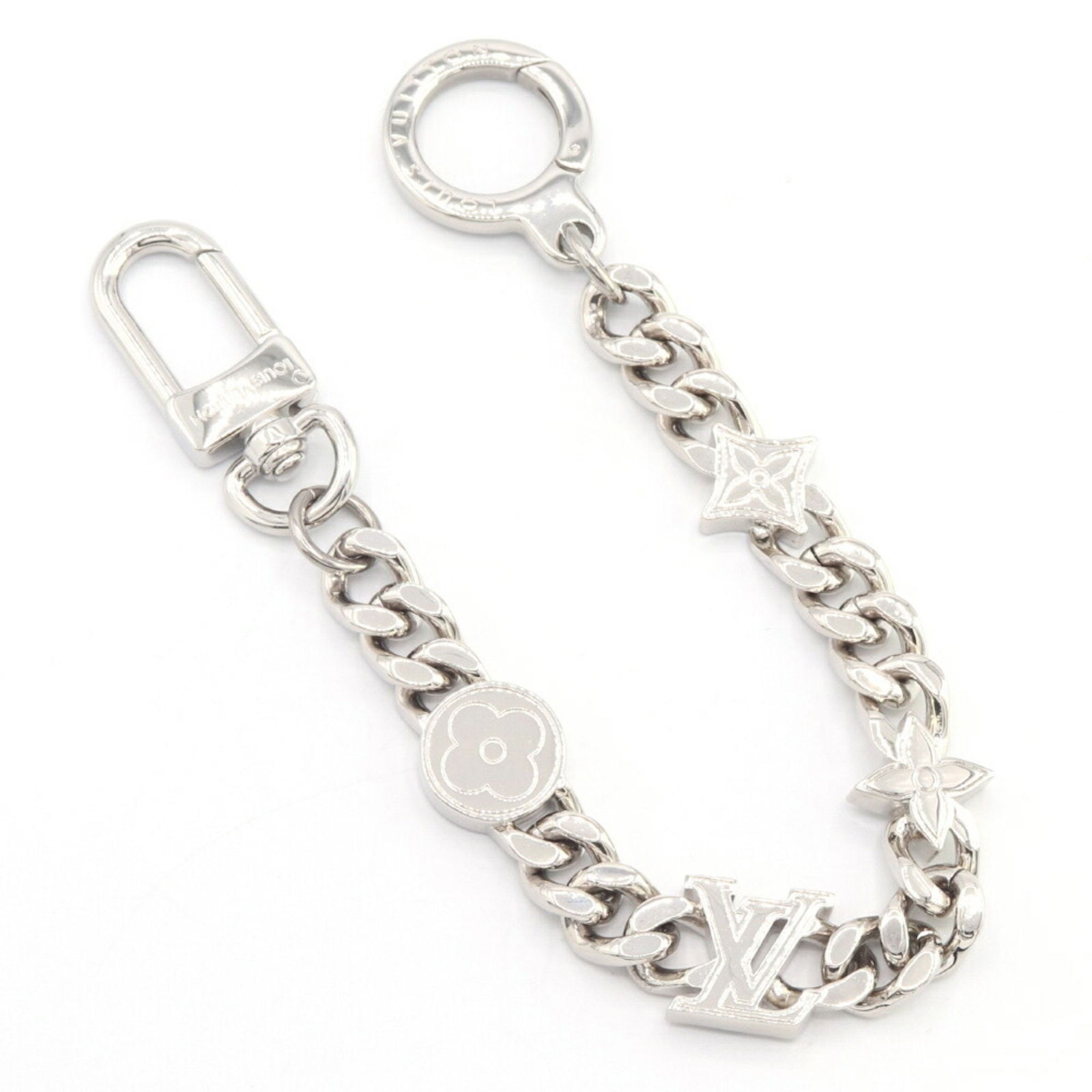 Louis Vuitton Monogram Element Chain Key Ring Charm Silver Metal: Louis Vuitton Monogram Element Chain Key Ring Charm Silver Metal This stylish Louis Vuitton Bag Charm features the iconic Monogram Element Chain design, expertly crafted in high-quality metal. Designe