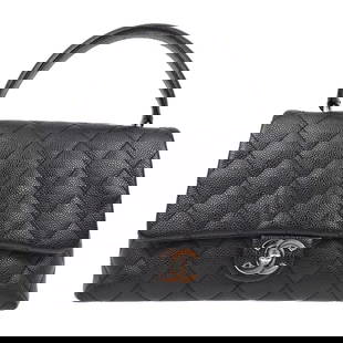 Chanel Classic Flap Black Caviar Top Handle Handbag: Chanel Classic Flap Black Caviar Top Handle Handbag This exquisite Chanel Top Handle Handbag is crafted from high-quality black caviar skin, offering a luxurious and durable finish. The bag features
