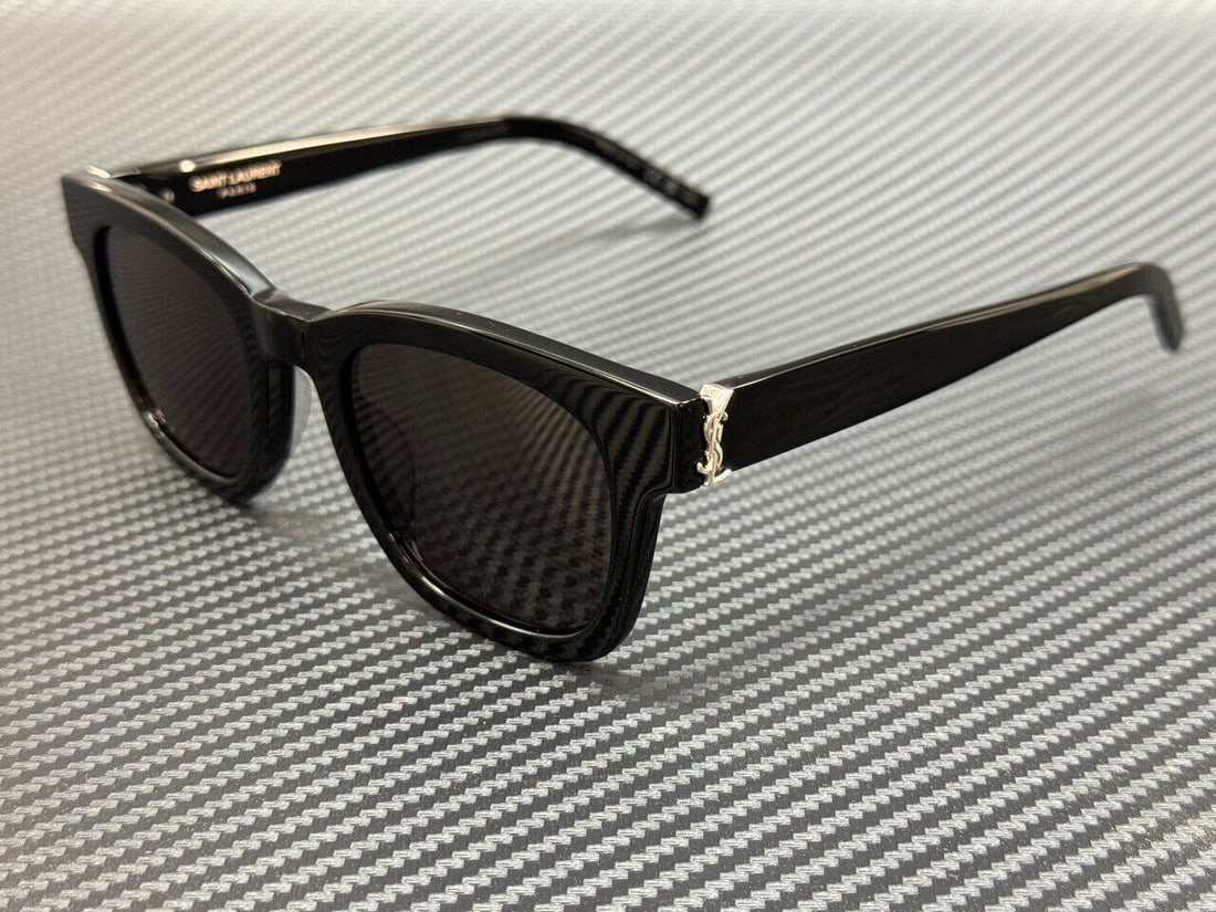 Saint Laurent SL M124 001 Unisex Black 49mm Sunglasses: Saint Laurent SL M124 001 Unisex Black 49mm Sunglasses Elevate your style with these unisex sunglasses from Saint Laurent. Featuring a sleek black frame, these sunglasses are designed to offer both pr