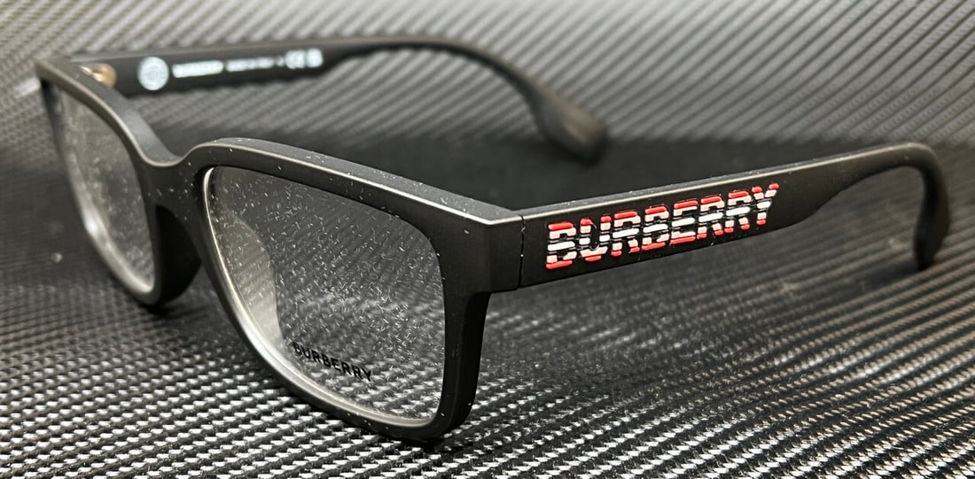 Burberry BE2379U 3464 Men's 55mm Matte Black Eyeglasses: Burberry BE2379U 3464 Men's 55mm Matte Black Eyeglasses Discover the contemporary style of Burberry BE2379U 3464 Eyeglasses, designed specifically for men. These eyeglasses feature a sleek matte black