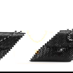 Chanel Mini Square Classic Flap Black Lambskin Leather Bag: Chanel Mini Square Classic Flap Black Lambskin Leather Bag The Chanel Mini Square Classic Flap is an elegant accessory crafted from luxurious quilted lambskin leather. It features a chic leather