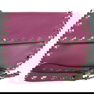 Valentino Garavani Purple Leather Metal Shoulder Bag 13 x 17 x 5.5 cm: Valentino Garavani Purple Leather Metal Shoulder Bag 13 x 17 x 5.5 cm Introducing the Valentino Garavani shoulder bag, a perfect blend of style and sophistication. Crafted from premium leather and
