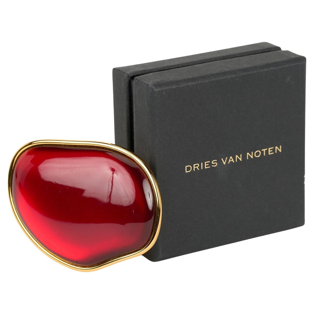 Dries Van Noten Oversize Red Lucite Ring with Original Box: Dries Van Noten Oversize Red Lucite Ring with Original Box Make a bold statement with this Dries Van Noten oversize ring, expertly crafted with yellow gold plating and a striking red lucite cabochon.