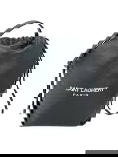 Saint Laurent Lambskin Teddy Black Drawstring Bucket Bag with Silver Hardware: Saint Laurent Lambskin Teddy Black Drawstring Bucket Bag with Silver Hardware Introducing the Saint Laurent Lambskin Teddy Drawstring Sac Bucket Bag, a stylish and versatile choice for any occasion.