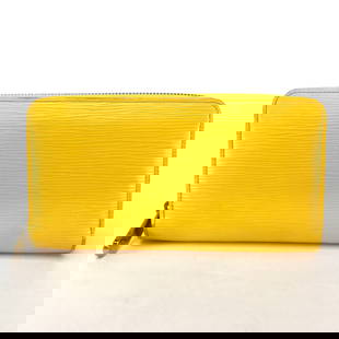 Louis Vuitton Epi Citron Yellow Zip Around Long Wallet 19.5cm x 10cm: Louis Vuitton Epi Citron Yellow Zip Around Long Wallet 19.5cm x 10cm This elegant Louis Vuitton Epi Zip Around Long Wallet is crafted from high-quality leather in a vibrant citron yellow color,
