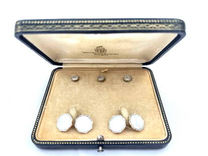 Art Deco Larter & Sons Platinum Gold Mother of Pearl Cufflinks Set: Art Deco Larter & Sons Platinum Gold Mother of Pearl Cufflinks Set This exquisite Art Deco dress set features cufflinks and three studs crafted from platinum, 14K gold, and mother of pearl. Each cuffl