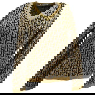 Christian Dior Trotter Brown Wool Sweater V-Neck Long Sleeve: Christian Dior Trotter Brown Wool Sweater V-Neck Long Sleeve Elevate your casual wardrobe with this elegant Christian Dior Trotter Sweater. Crafted from 100% wool, this brown sweater features a