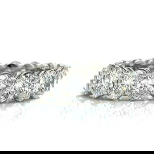 Platinum Eternity Band with 14 Oval Diamonds 7.50 Ct F-G VVS-VS: Platinum Eternity Band with 14 Oval Diamonds 7.50 Ct F-G VVS-VS This stunning Platinum Diamond Eternity Band features 14 exquisite oval diamonds, totaling approximately 7.50 ct. Each diamond displays