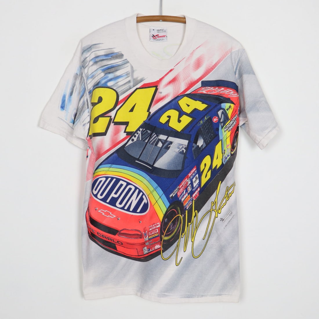 Vintage 1996 Jeff Gordon Nascar All Over Print Shirt: Vintage 1996 Jeff Gordon Nascar All Over Print Shirt This original vintage 1996 Jeff Gordon Nascar Chase Racewear All Over Print Shirt showcases iconic racing graphics on both the front and back. Craf