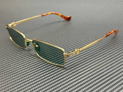 GUCCI GG1600S 003 Gold Frame 56mm Unisex Sunglasses: GUCCI GG1600S 003 Gold Frame 56mm Unisex Sunglasses Elevate your style with these GUCCI GG1600S 003 sunglasses, designed for both men and women. Featuring a luxurious gold frame, these sunglasses