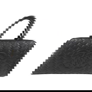 Chanel Black Grained Calfskin Boston Bag with Gold Hardware: Chanel Black Grained Calfskin Boston Bag with Gold Hardware This Chanel Boston Bag showcases exquisite craftsmanship with its luxurious grained calfskin in a classic black hue. Designed for women,