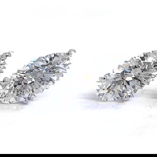 14K White Gold 3.02 Ct Diamond Stud Earrings H-I SI2-I1: 14K White Gold 3.02 Ct Diamond Stud Earrings H-I SI2-I1 Elevate your elegance with these stunning 14K White Gold Diamond Stud Earrings. Each earring features a beautifully cut diamond weighing 1.51 Ct