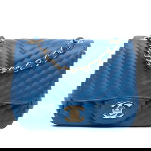 Chanel Mini Square Classic Chevron Blue Lambskin Flap Bag: Chanel Mini Square Classic Chevron Blue Lambskin Flap Bag This Chanel Mini Square Classic Chevron features a stunning quilted lambskin leather body in a sophisticated blue hue. It is designed with a l