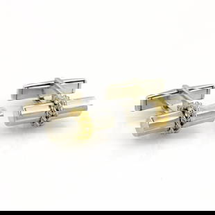 Tiffany & Co. Sterling Silver 18k Gold Leaf Cufflinks: Tiffany & Co. Sterling Silver 18k Gold Leaf Cufflinks This exquisite pair of cufflinks, crafted by Tiffany & Co., showcases a sophisticated blend of sterling silver and 18k yellow gold. Designed with