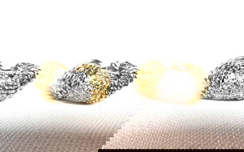 Elegant French 18K Yellow Gold Diamond Cuff Earrings: Elegant French 18K Yellow Gold Diamond Cuff Earrings This exquisite pair of French earrings showcases the elegance of 18K yellow gold adorned with stunning diamonds. Featuring approximately 0.65 ct of