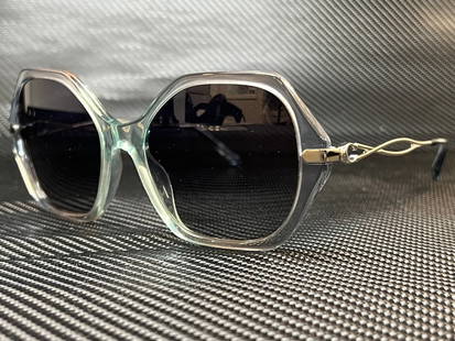 Coach HC8315 Blue Round 57mm Women's Sunglasses: Coach HC8315 Blue Round 57mm Women's Sunglasses Elevate your style with these stunning COACH HC8315 women's sunglasses. Featuring a chic round design, these shades are perfect for adding a pop of