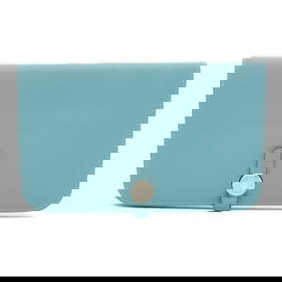 Hermes Dogon GM Bi-fold Long Wallet Swift Leather Blue: Hermes Dogon GM Bi-fold Long Wallet Swift Leather Blue Presenting the Hermes Dogon GM Bi-fold Long Wallet, a perfect blend of elegance and functionality designed for women. Crafted from high-quality