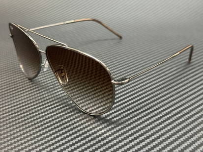 Ray-Ban RBR0101S 004 CB Gunmetal Brown Gradient Sunglasses 62mm: Ray-Ban RBR0101S 004 CB Gunmetal Brown Gradient Sunglasses 62mm Discover the stylish Ray-Ban RBR0101S 004 CB Sunglasses, featuring a sleek gunmetal frame that perfectly complements the brown