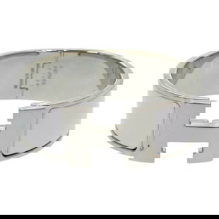 Hermes H Motif Click Clack GM Bangle Silver White 16cm: Hermes H Motif Click Clack GM Bangle Silver White 16cm This exquisite Hermes H motif Click Clack GM bracelet is a stunning addition to any woman's jewelry collection. Crafted from metal, the bracelet