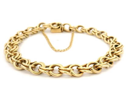 Vintage 13-14k Yellow Gold Double Curb Link Charm Bracelet 7.5in: Vintage 13-14k Yellow Gold Double Curb Link Charm Bracelet 7.5in This vintage charm bracelet features a stunning double curb link design crafted from solid 13-14k yellow gold. The bracelet measures 7.