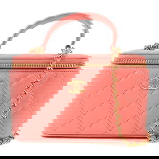 CHANEL CC GHW Pink Lambskin Leather 2 Way Top Handle Vanity Bag: CHANEL CC GHW Pink Lambskin Leather 2 Way Top Handle Vanity Bag Introducing the CHANEL CC Top Handle Vanity Case, a stunning 2-way bag crafted from luxurious lambskin leather in an elegant pink hue. T