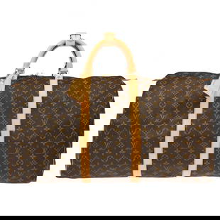 Louis Vuitton Keepall 60 Monogram Duffle Bag Vintage Travel Handbag: Louis Vuitton Keepall 60 Monogram Duffle Bag Vintage Travel Handbag This Louis Vuitton Monogram Keepall 60 Duffle Handbag is an iconic travel accessory, perfect for the stylish jet setter. Featuring a