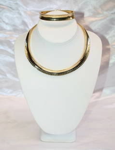 1960s French 18K Gold Cleopatra Necklace Bracelet Set: 1960s French 18K Gold Cleopatra Necklace Bracelet Set Discover this exquisite 1960's French 18K gold Cleopatra chic necklace and bracelet set, an exceptional piece of jewelry that showcases remarkable