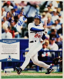 Eric Karros Signed 8x10 Dodgers Photo with 92 ROY Inscription Beckett COA: Eric Karros Signed 8x10 Dodgers Photo with 92 ROY Inscription Beckett COA This is an original 8x10 photograph signed by Eric Karros, featuring the inscription "92 ROY". It is an excellent