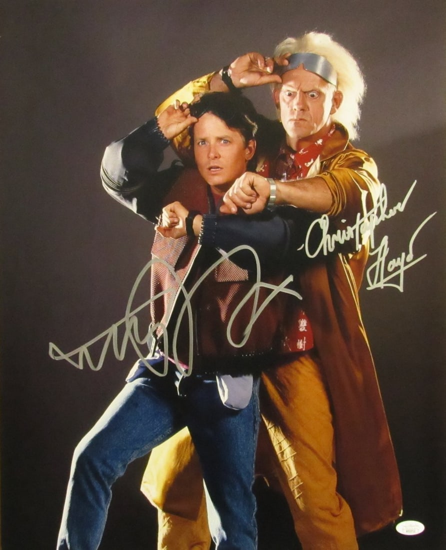 Michael J Fox Christopher Lloyd Autographed 16x20 Photo Back to the Future JSA Certified: Michael J Fox Christopher Lloyd Autographed 16x20 Photo Back to the Future JSA Certified This is an autographed 16x20 photo of Michael J. Fox and Christopher Lloyd from the iconic movie "Back to the F