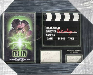 The Fly Framed Clapperboard Signed by Goldblum Davis Cronenberg Beckett Authenticated: The Fly Framed Clapperboard Signed by Goldblum Davis Cronenberg Beckett Authenticated This framed clapperboard from the iconic film "The Fly" features the autographs of key cast members Jeff Goldblum,